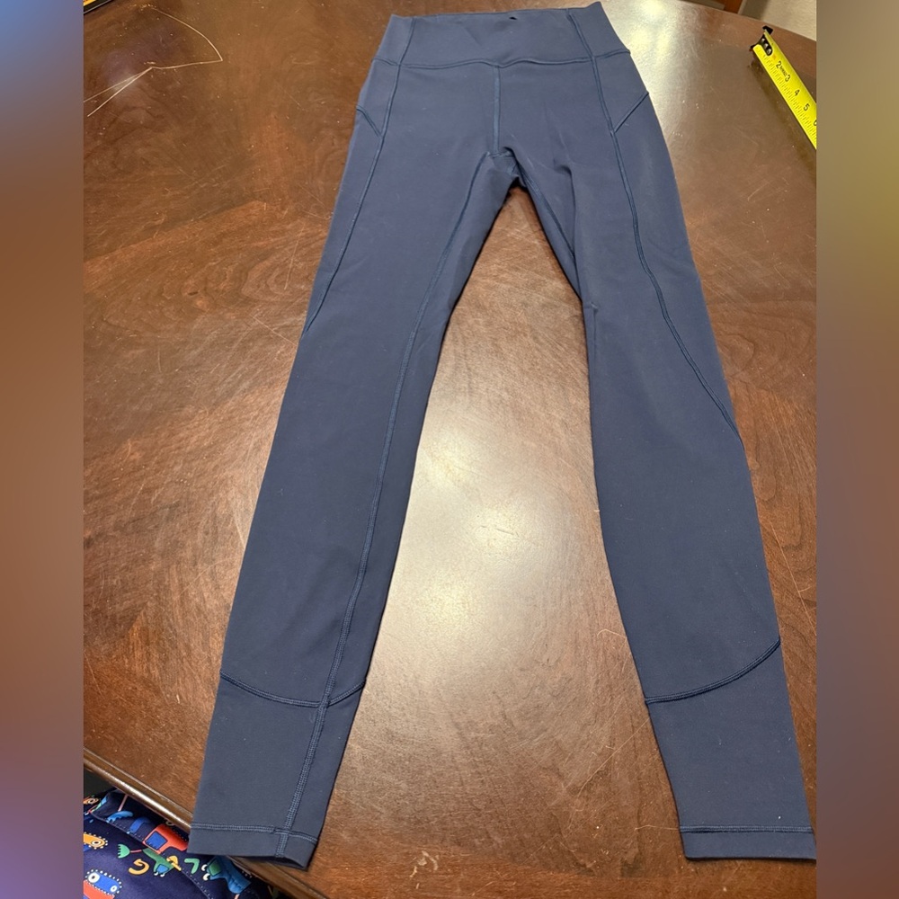 In-movement leggings, full length (28”) size 4. True navy.